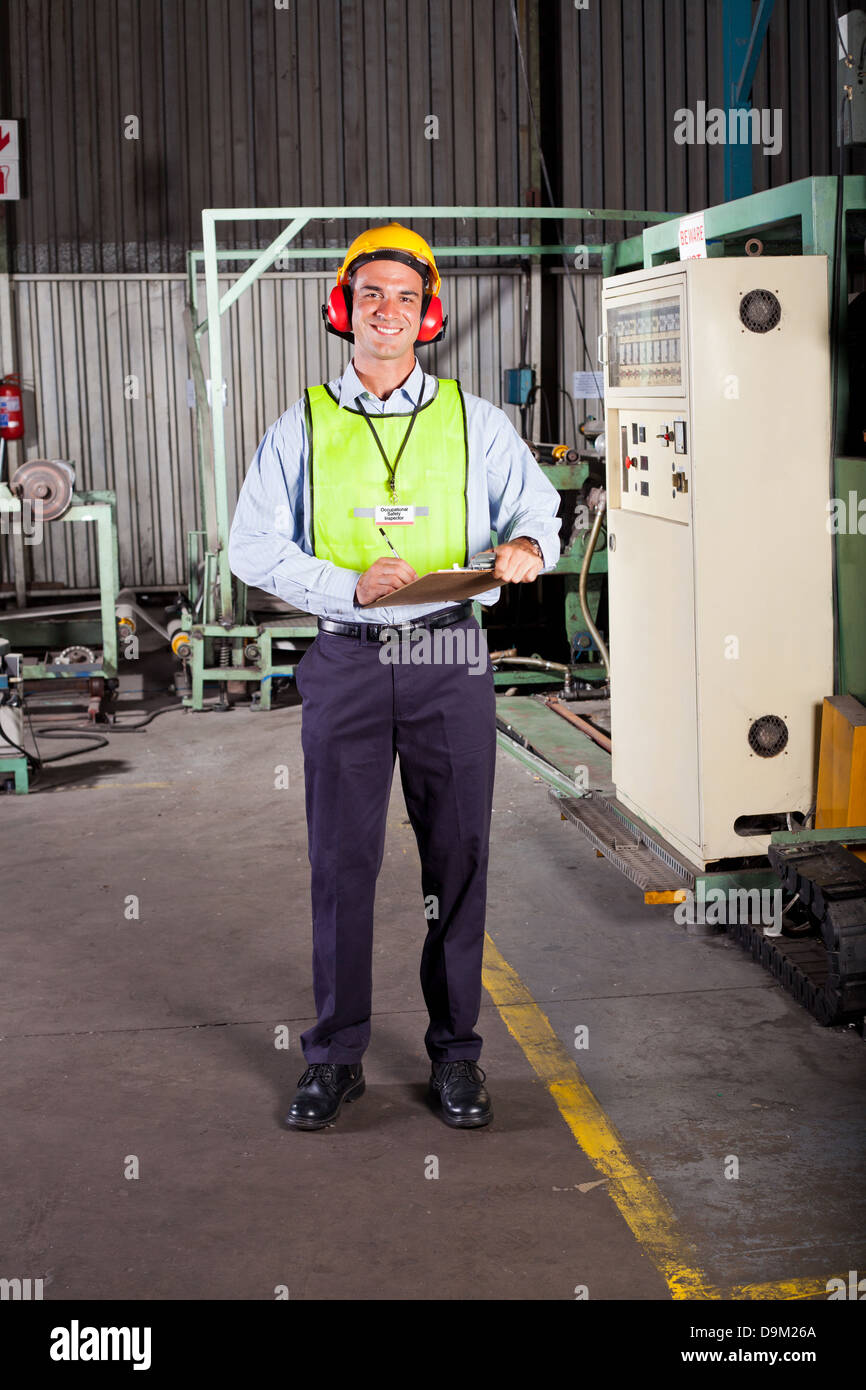 male occupational safety inspector inside factory Stock Photo