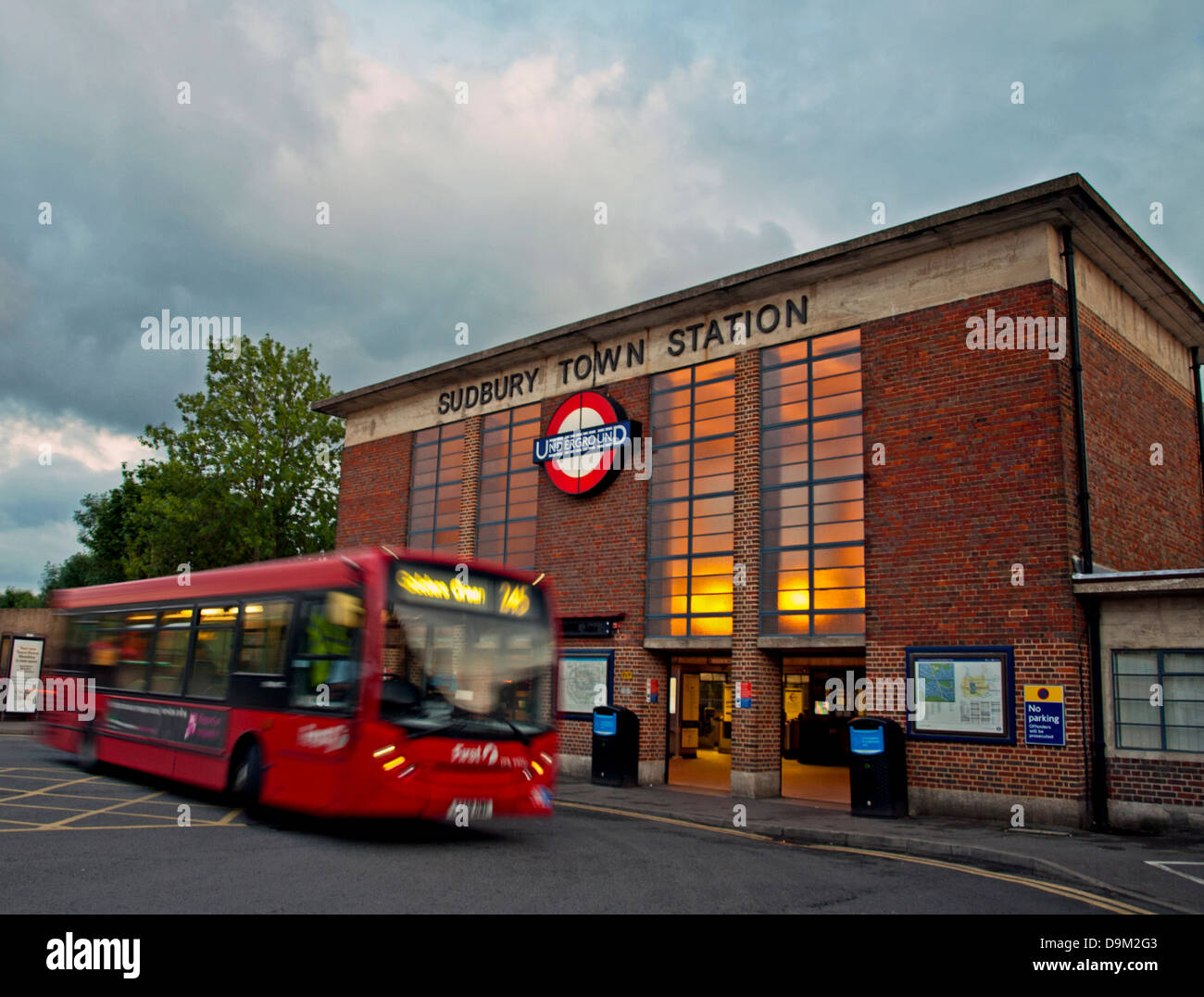 Bus in transit at Sudbury Town Station designed by Charles Holden, London, England, United