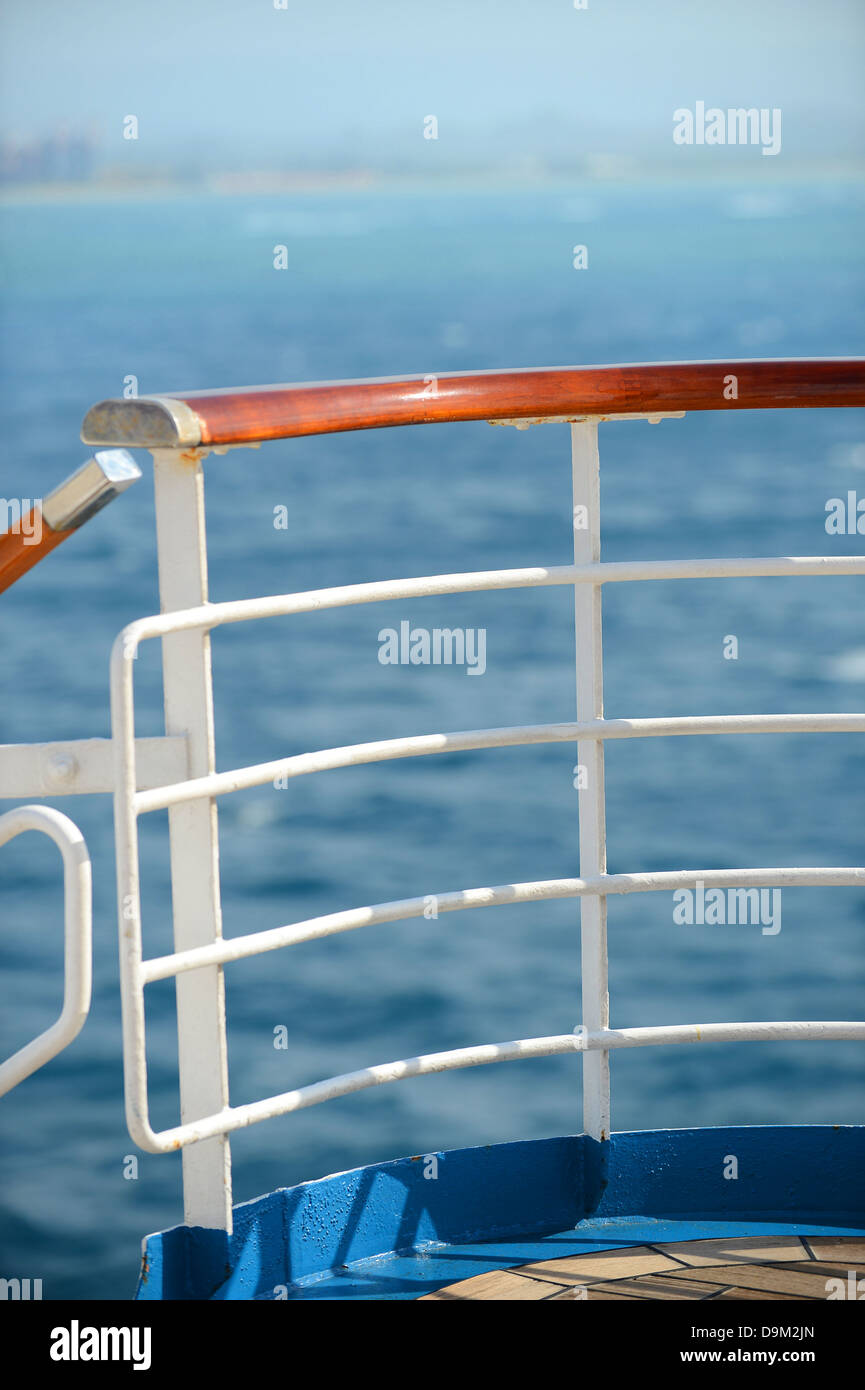 Passenger cruise ship rails with ocean in background Stock Photo