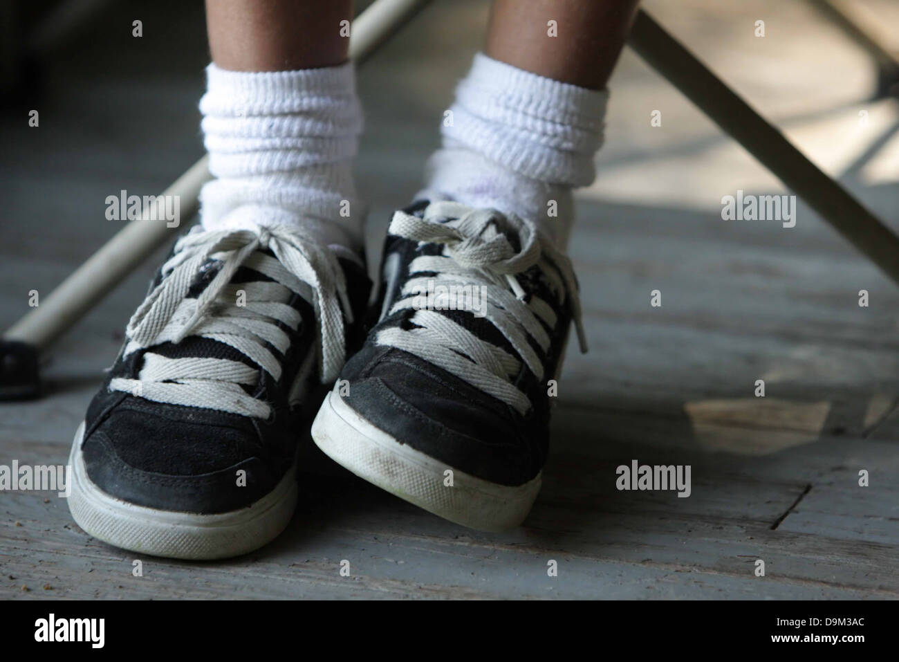 white sneakers and black socks