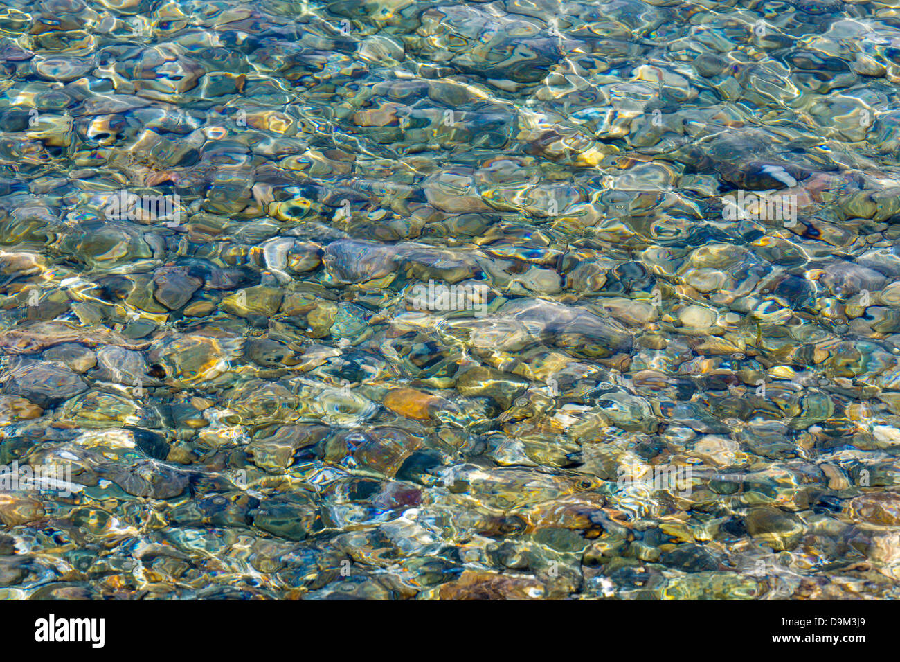 Rocky bottom though clear water on the Caribbean Island of St John in the US Virgin Islands Stock Photo