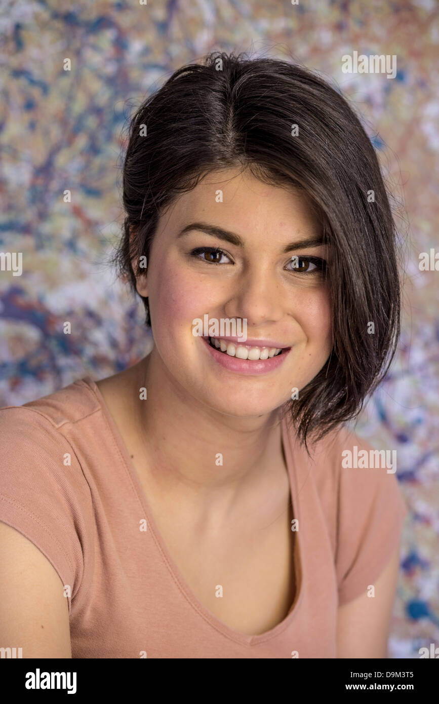 Confident attractive 16 year old girl with asymmetrical haircut Stock