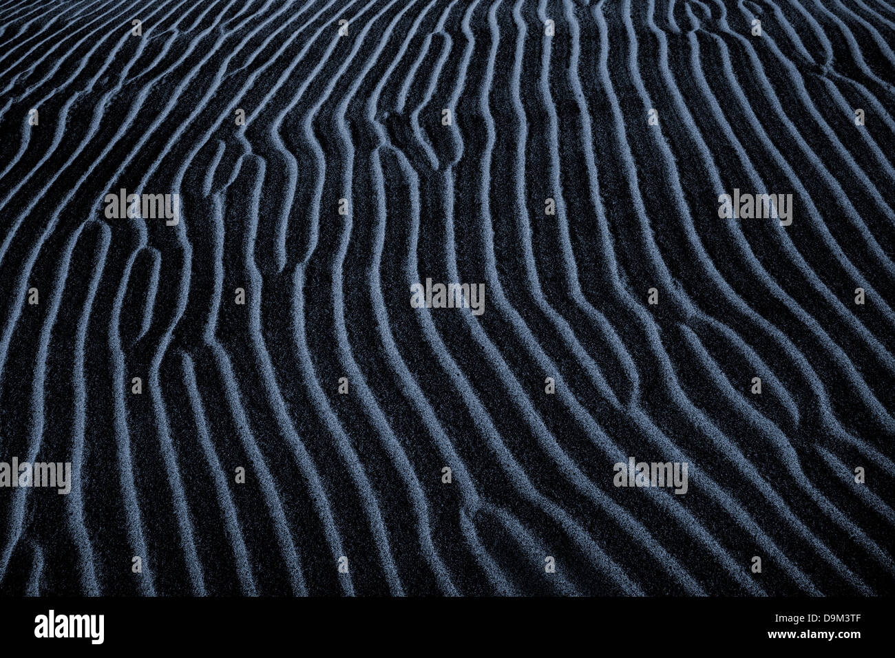 A Dark Blue Sand Ripples Nature Background, Death Valley; California, USA Stock Photo