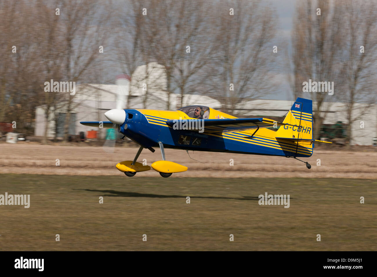 Laser Z200 G-CBHR landing on grass runway at Breighton Airfield Stock Photo