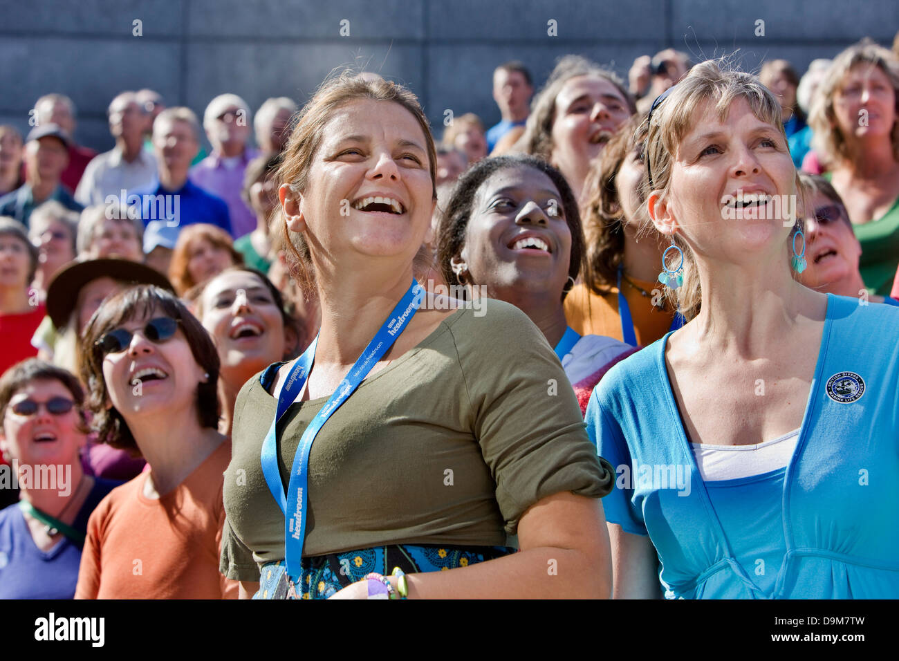 A thousand-voice adult choir in support of the charity WaterAid, Thames Festival, London, UK Stock Photo