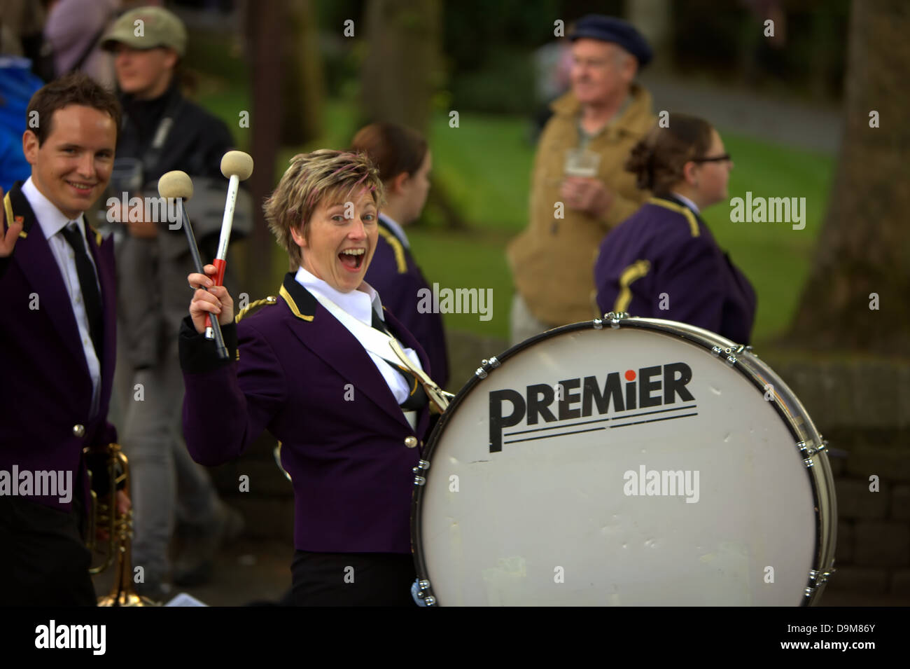 Happy girl-drummer at the Brass Band Contest on May 28, 2010 in Saddleworth, England. Stock Photo