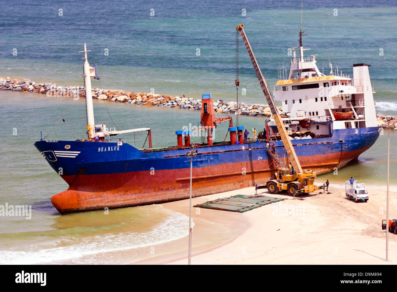 Ship breaking on the Beach, Coastal Freighter run aground in Ajman, United Arab Emirates Stock Photo