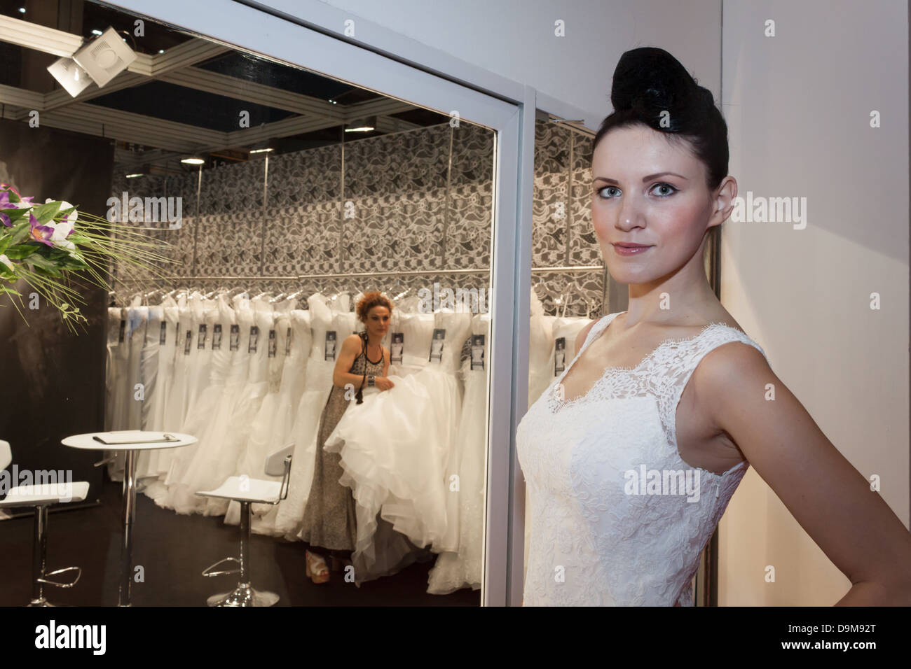 Milan, Italy - June 21, 2013: People visit SposaItalia, international exhibition of bridal and formal wear in Milan. Stock Photo