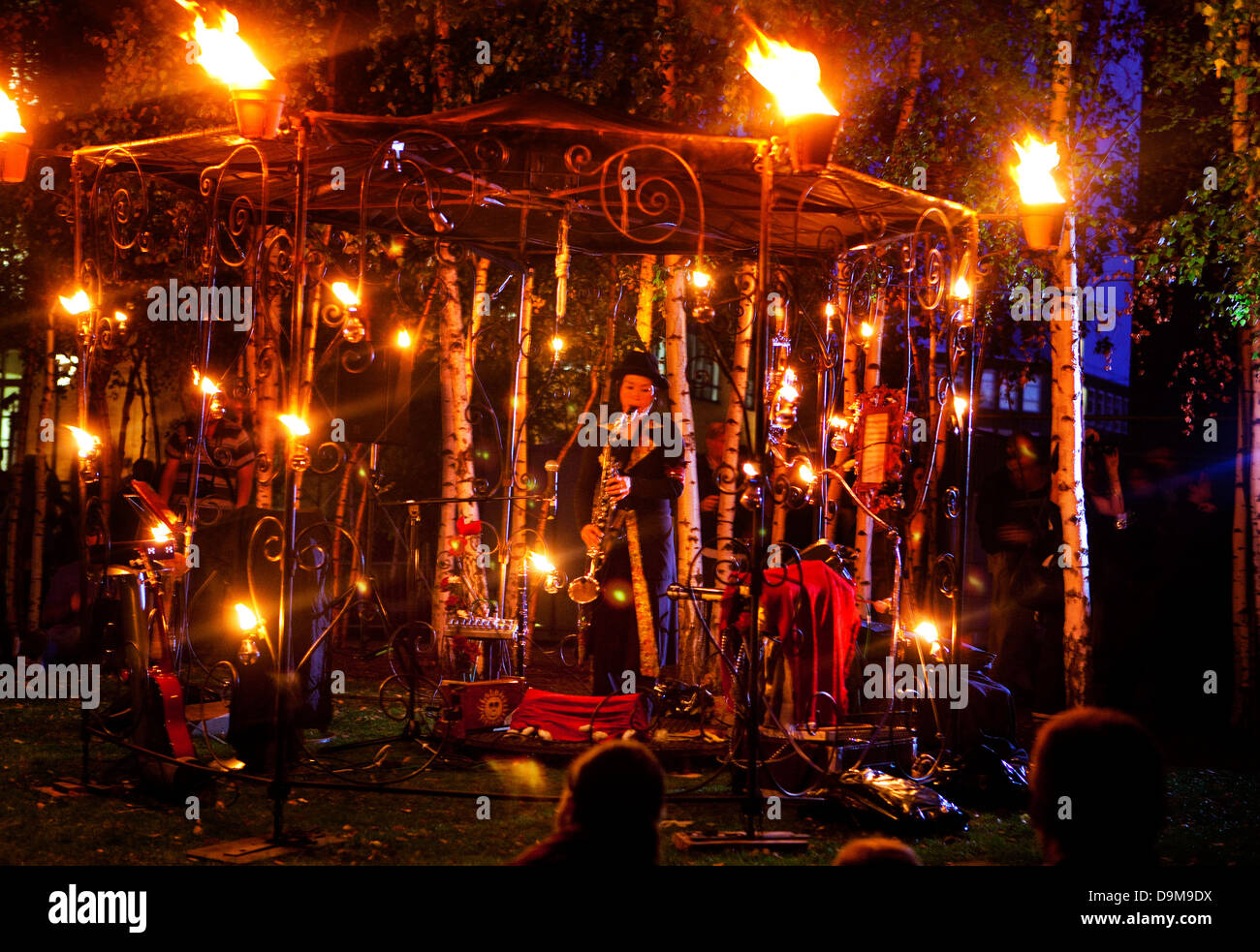 Thames Festival 2009. The Tate forecourt turned into a fire garden using turpentine lanterns, London UK Stock Photo