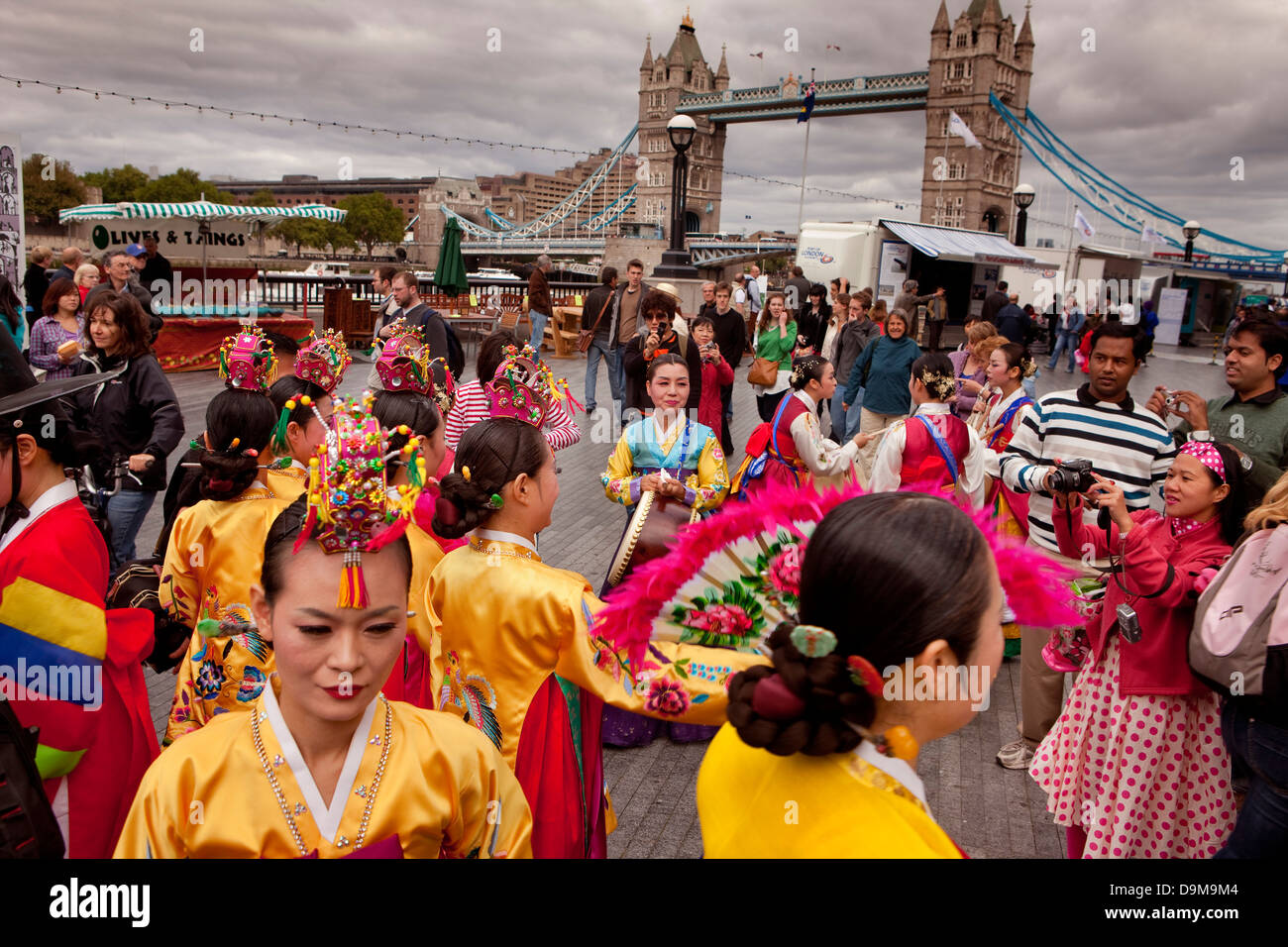 Thames Festival 2009. Korean Traditional dancers mixing with the London crowds, UK Stock Photo