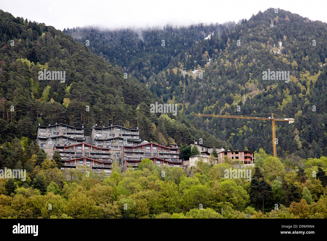 construction underway on steep mountain sides in andorra la vella valley andorra Stock Photo