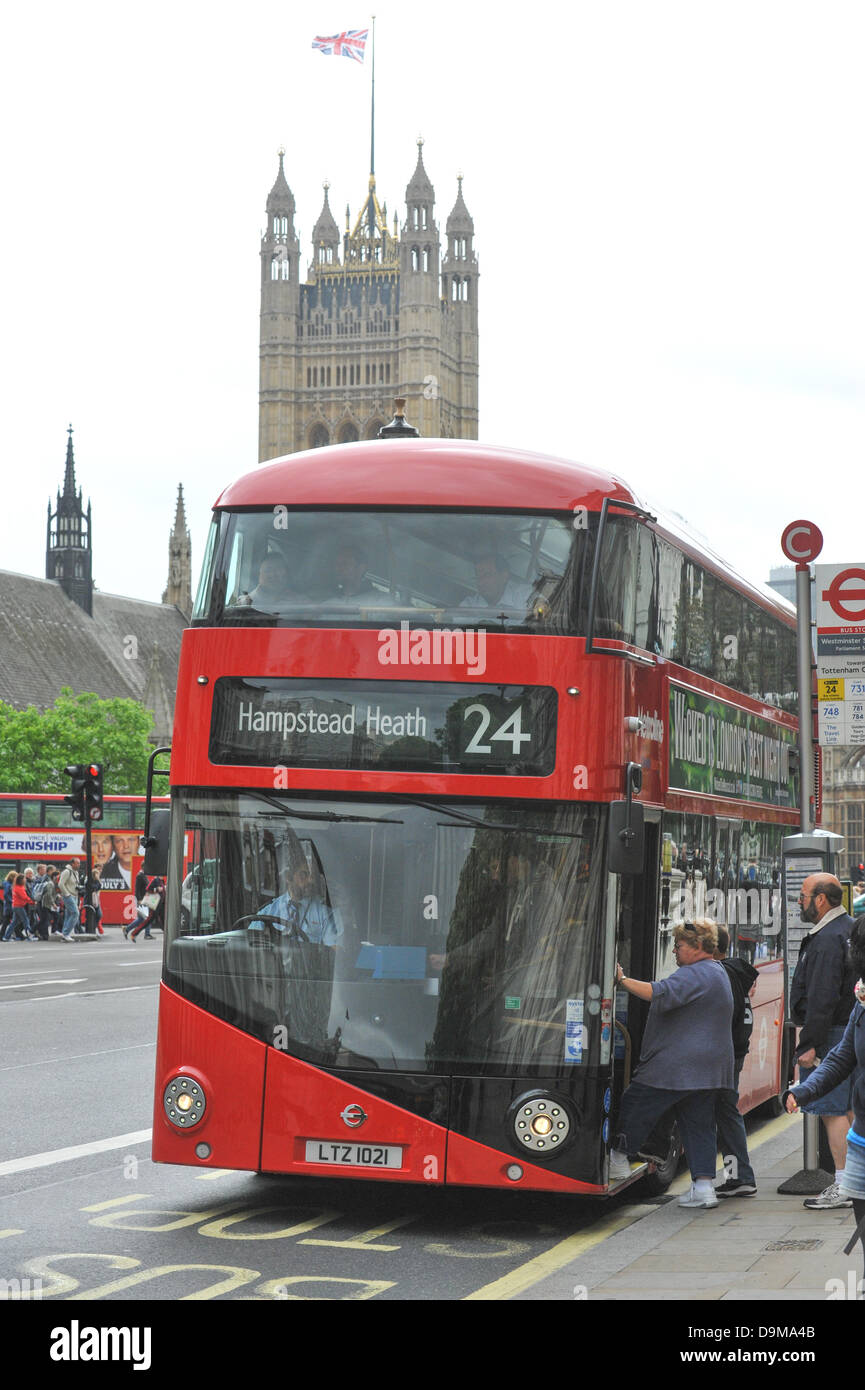 Whitehall, London, UK. 22nd June 2013. With Parliament in the background one of The New Bus for London (NB4L) on the 24 route on Whitehall. Credit:  Matthew Chattle/Alamy Live News Stock Photo