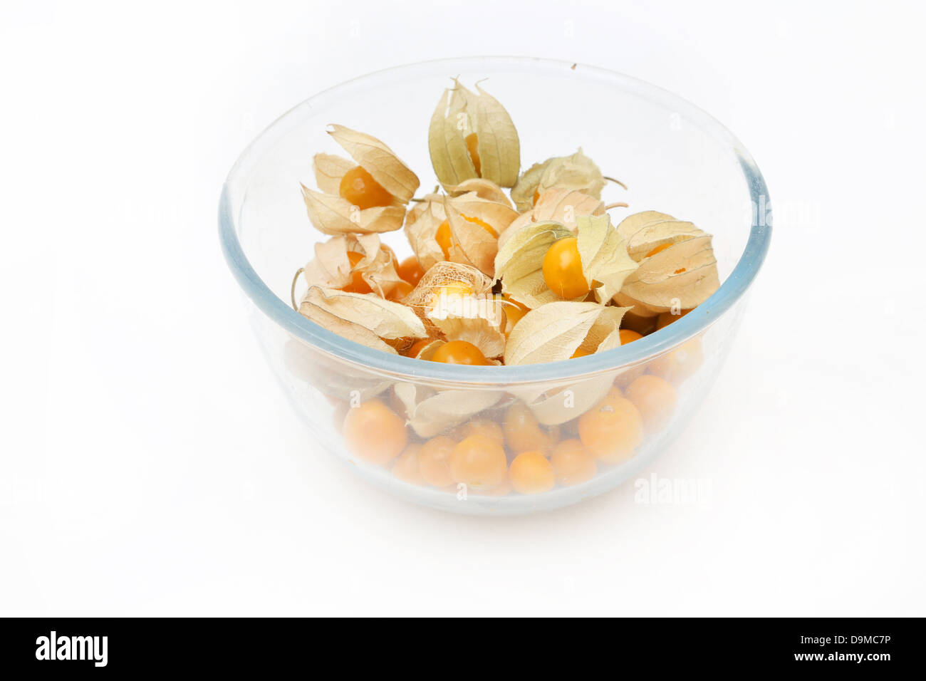 A Bowl Of Ripe Cape Gooseberries (Physalis Peruviana) All In Their Calyx From The Nightshade Family Stock Photo