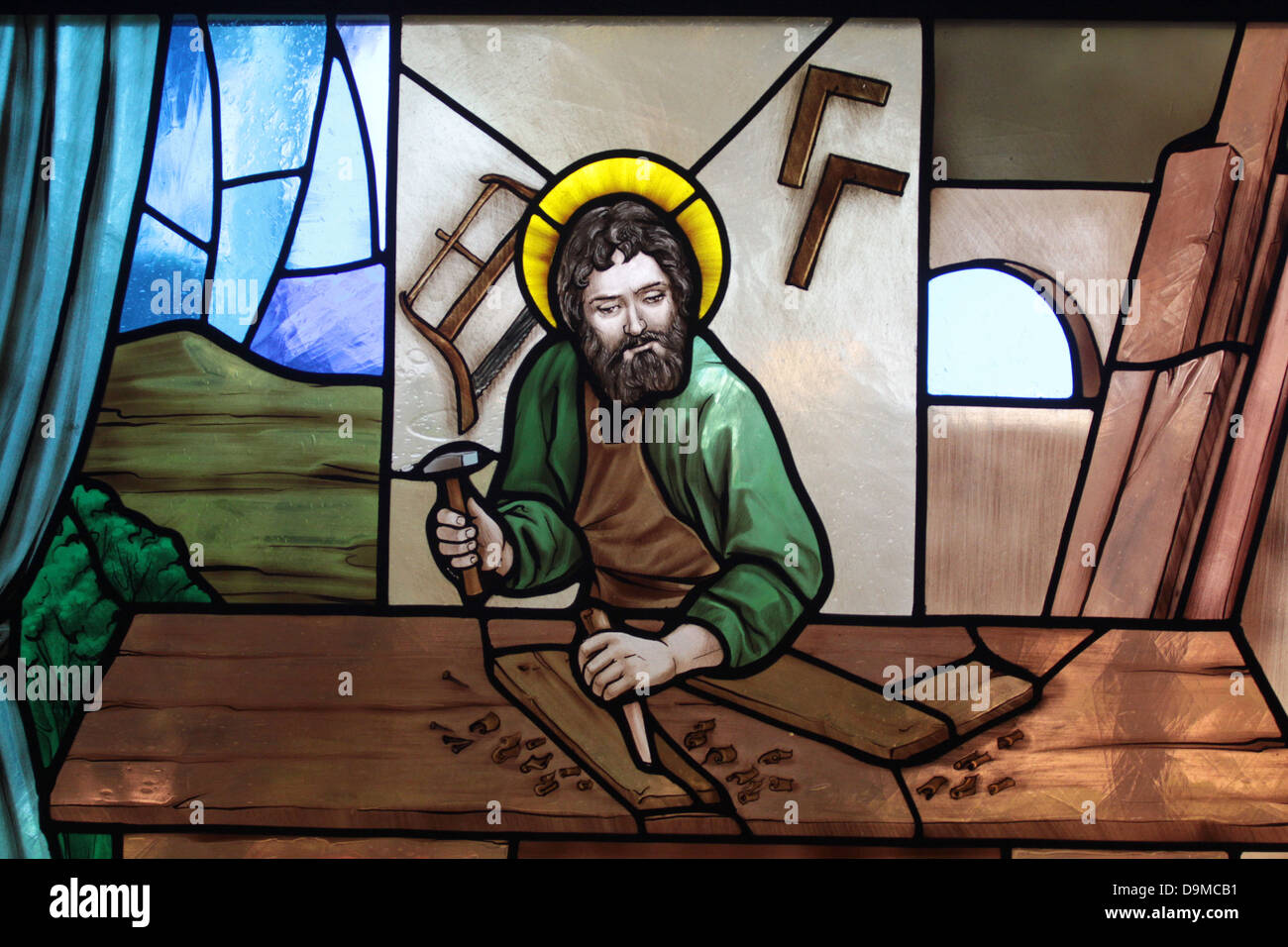 Stained glass art in the windows of the Mary, Queen of the Universe Shrine of Orlando, Florida. Stock Photo