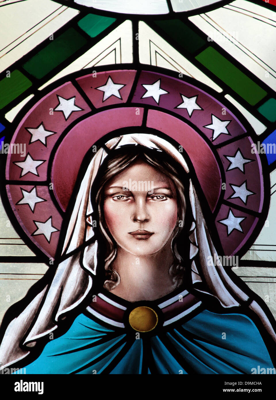 Stained glass art in the windows of the Mary, Queen of the Universe