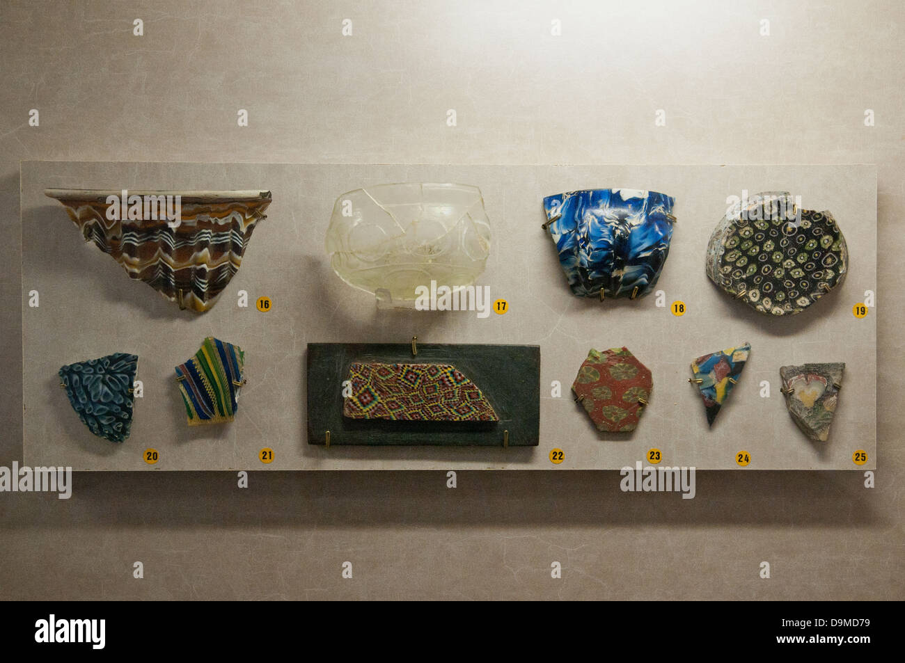 Various fragments of Roman broken glass and millefiori in Rolin Museum Autun France Stock Photo
