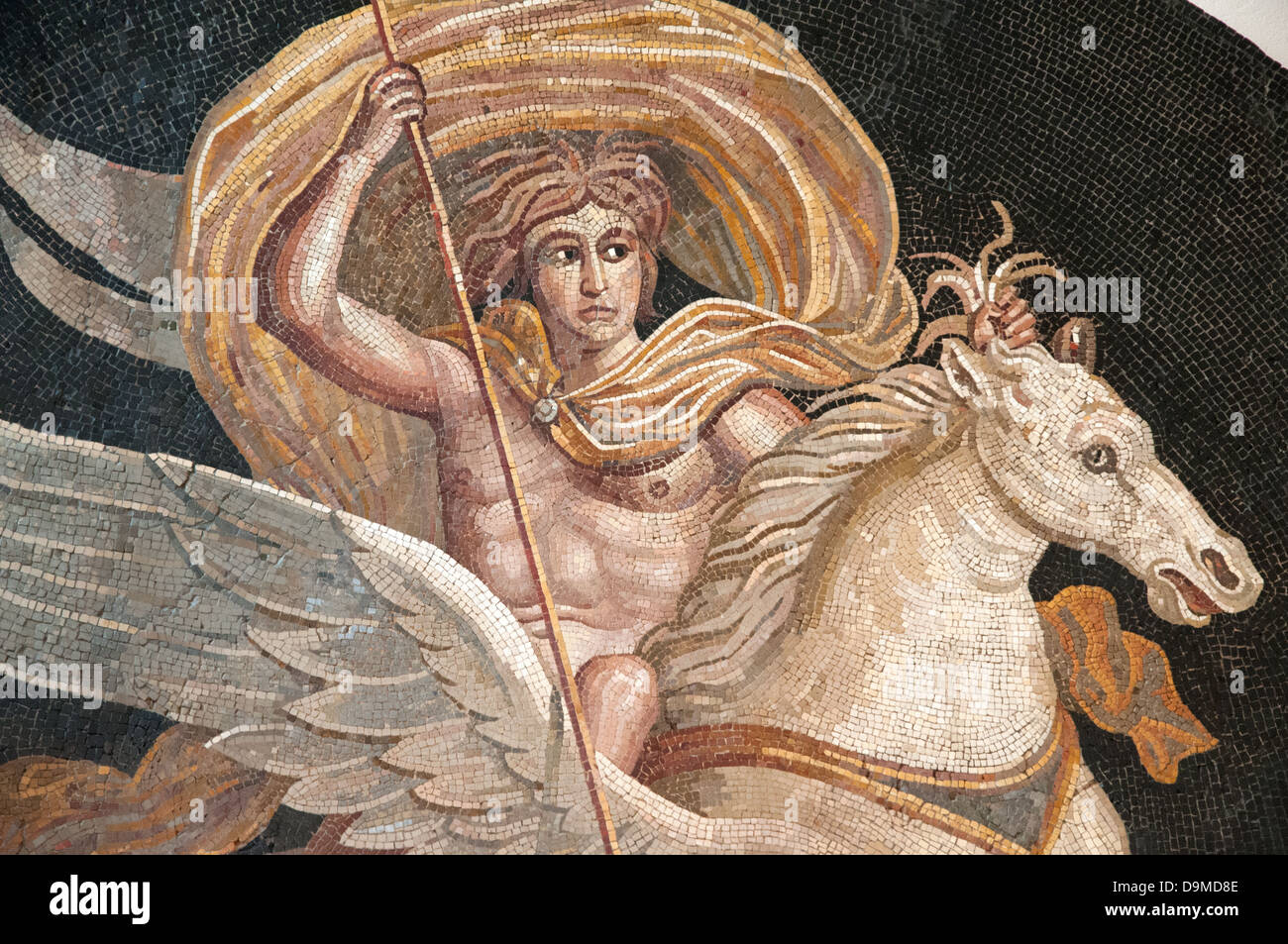Portion of Roman mosaic of ancient Greek Hero Bellerofon killing monster Chimera displayed in Museum Rolin Autun France Stock Photo