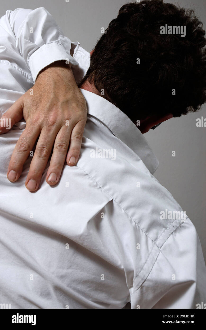 Man with back pain Stock Photo