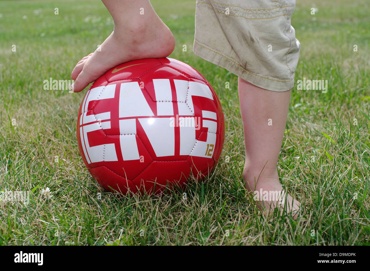 red football boy legs player Stock Photo
