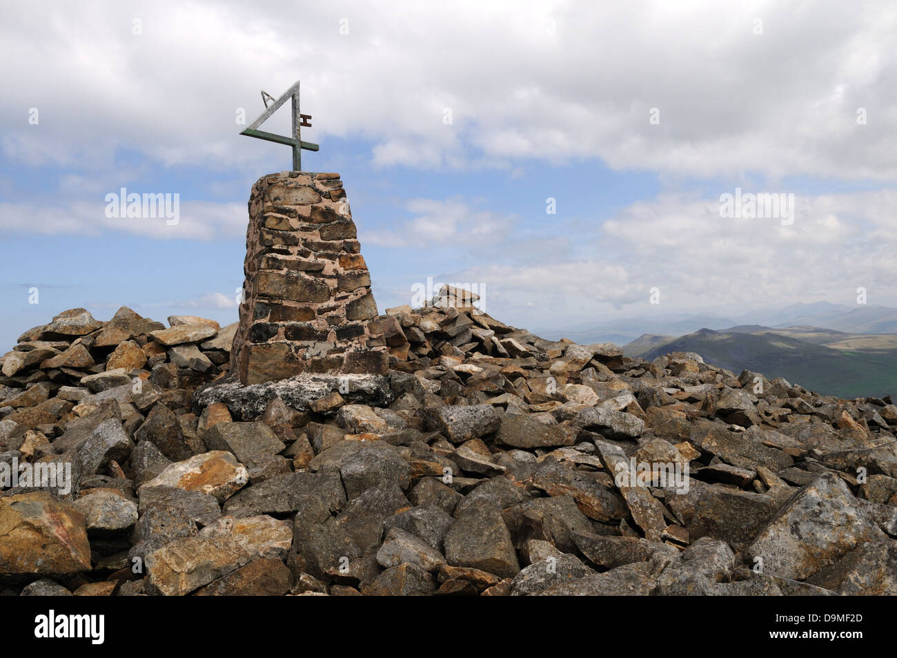 Cairn and trig Point on the summit of Yr Eifl Mountain or The Rivals Gwynedd Llyn Peninsula Wales Cymru UK GB Stock Photo