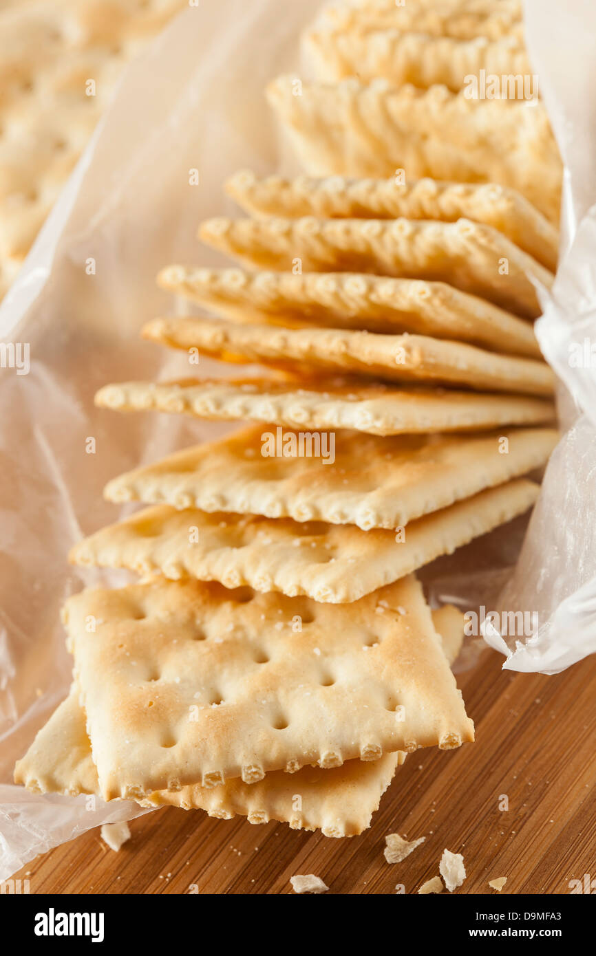 Organic Whole Wheat Soda Crackers ready to eat Stock Photo