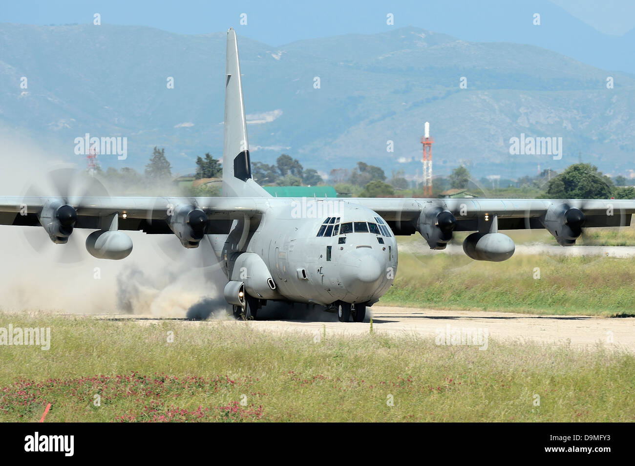 May 9, 2013 - A C-130 Hercules of the Italian Air Force landing on an unpaved landing strip, Grazzanise, Italy. Stock Photo