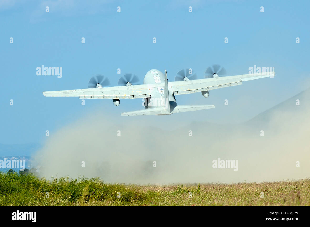 May 9, 2013 - A C-130 Hercules of the Italian Air Force taking off from an unpaved landing strip, Grazzanise, Italy. Stock Photo