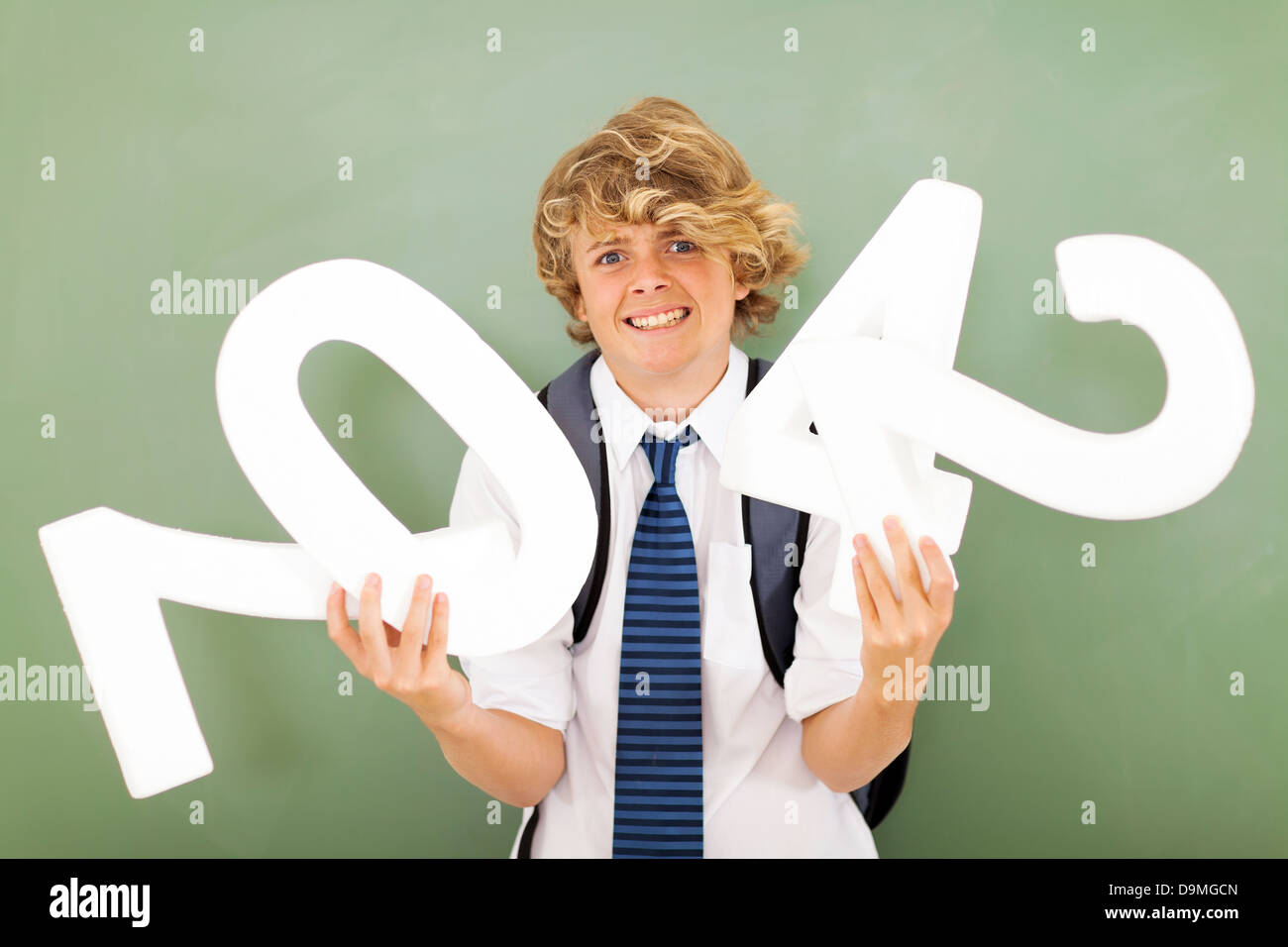 male high school student is struggling with mathematics subject Stock Photo