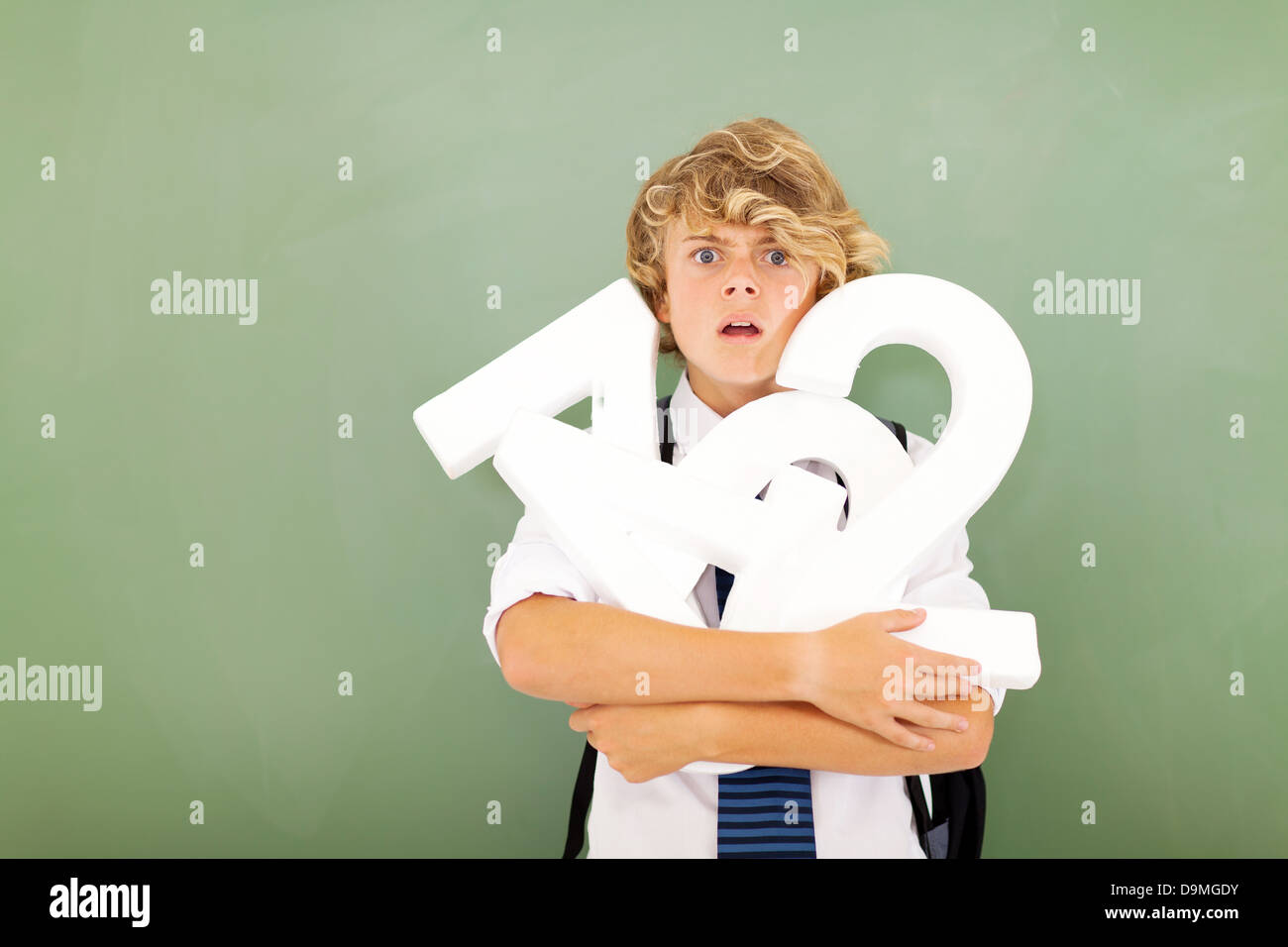 young high school student feeling hopeless in mathematics subject Stock Photo