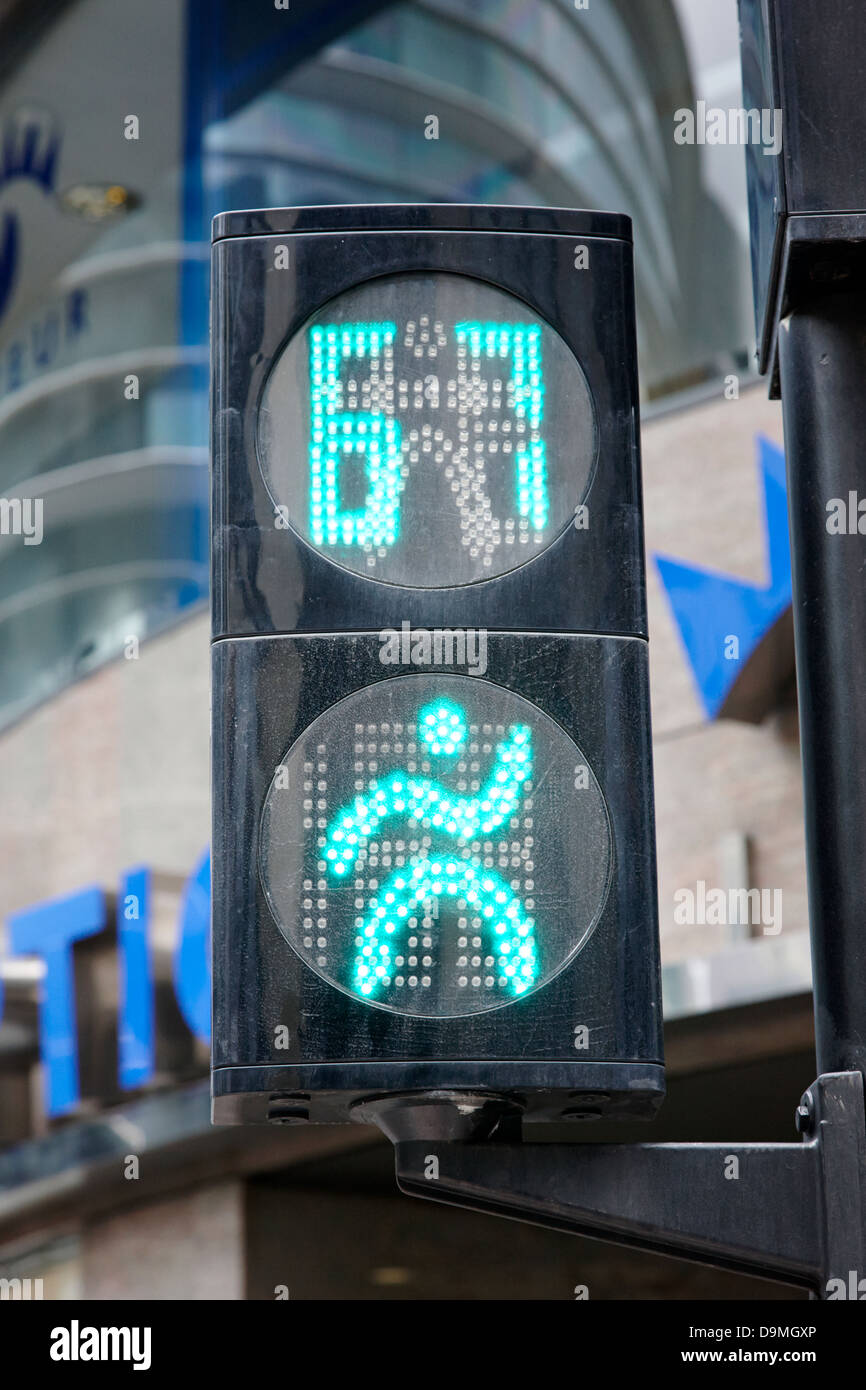 green go pedestrian crossing traffic lights countdown clock crossing road in andorra la vella andorra Stock Photo