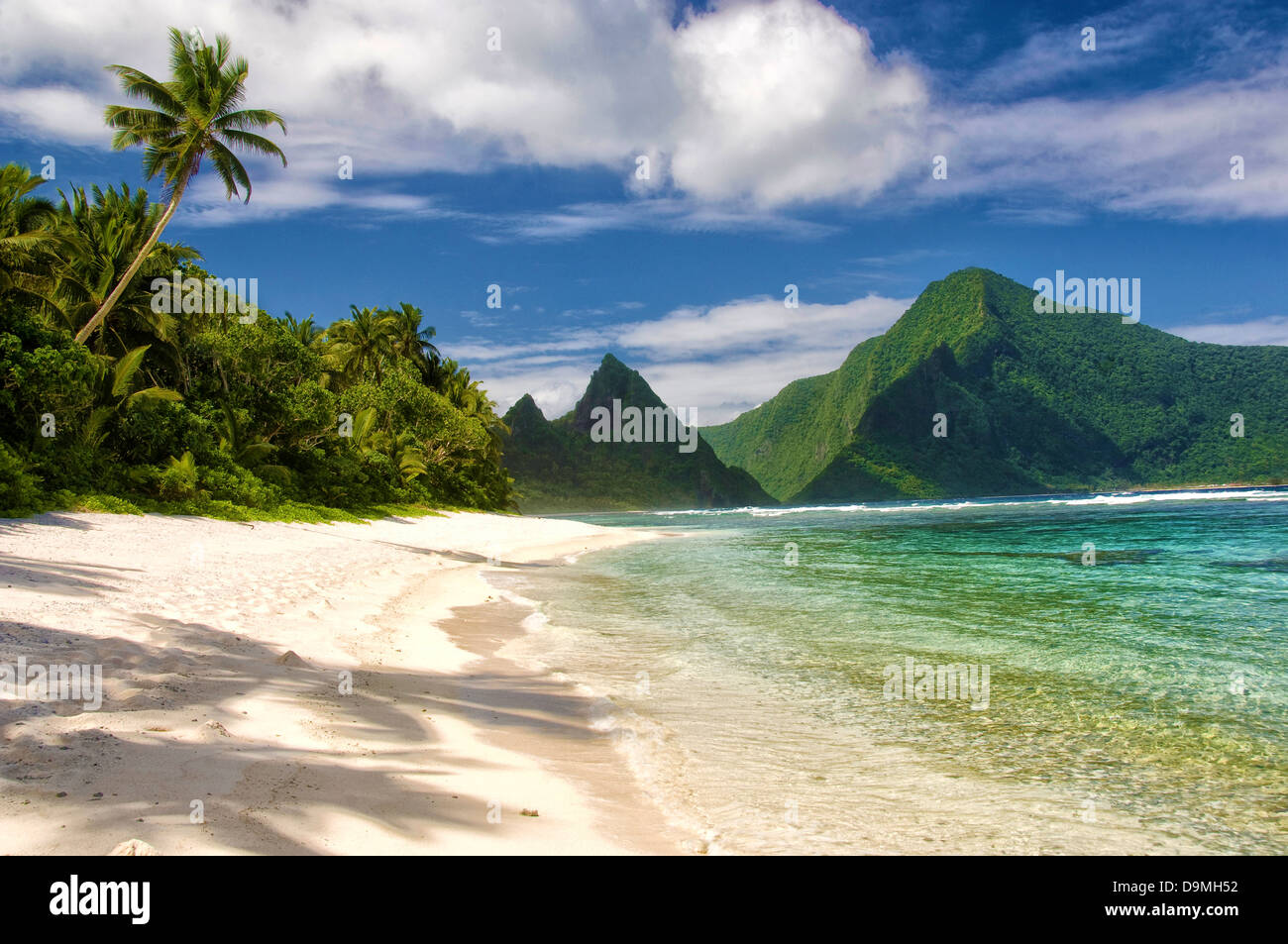 A secluded beach Si'u Point Trail on Ta'u Island in the American Samoa National Park. Part of the Manua volcanic island chain, Ta'u is sparsely populated and has miles of pristine beach. Stock Photo