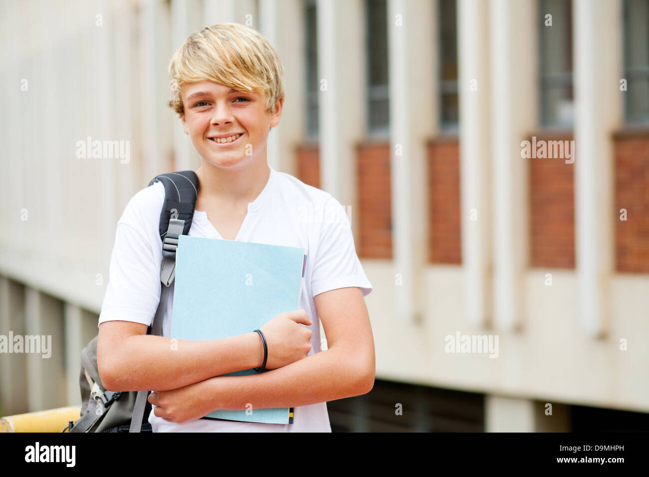happy male high school student portrait in school Stock Photo