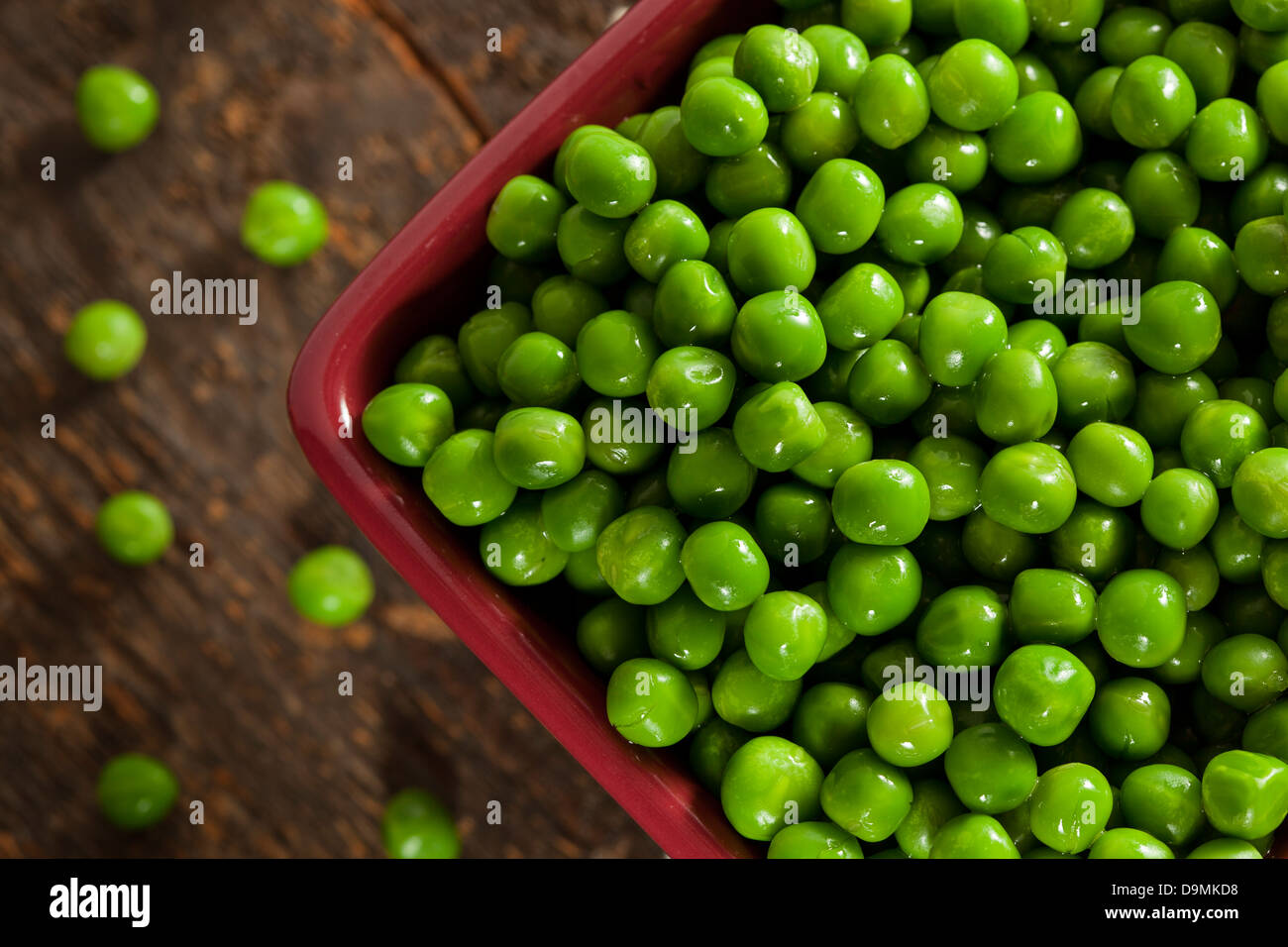 Fresh Green Organic Cooked peas against a background Stock Photo
