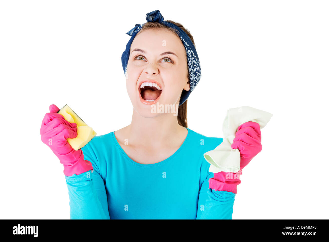 Tired and exhausted cleaning woman screaming loud Stock Photo