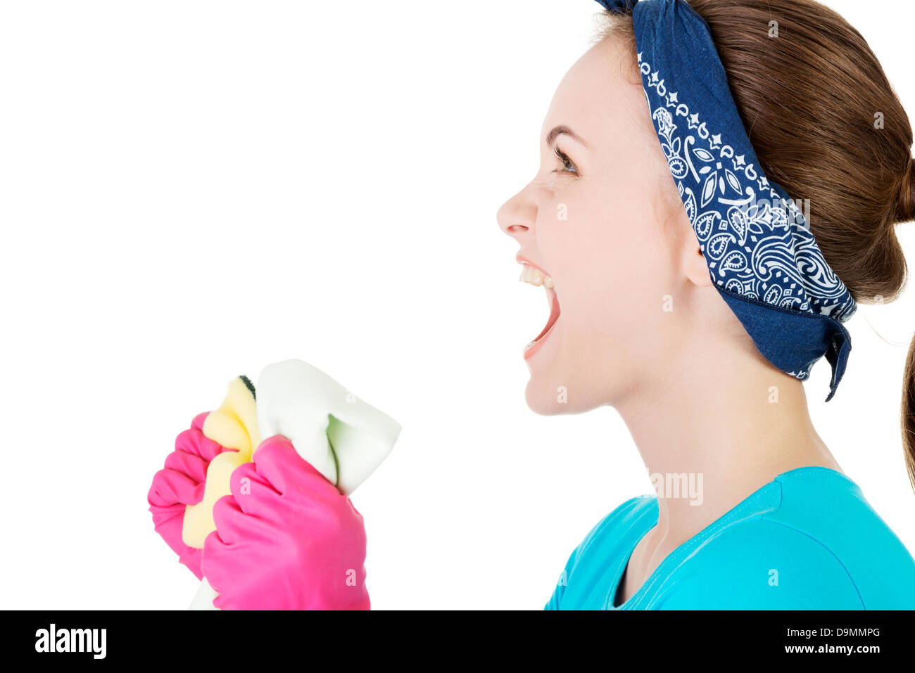 Tired and exhausted cleaning woman screaming loud Stock Photo