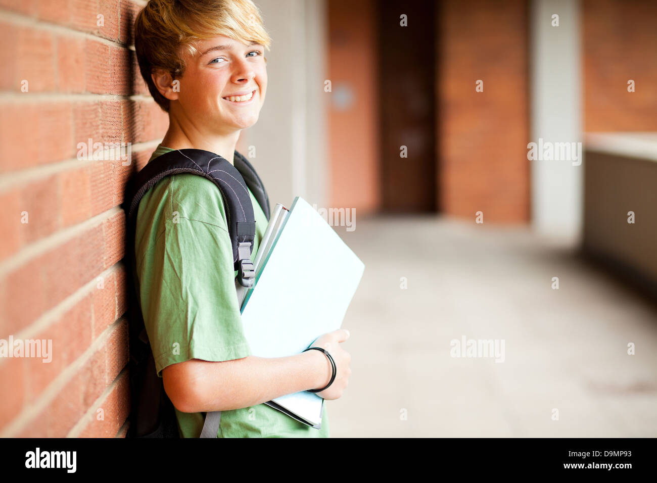 happy middle school boy in school Stock Photo