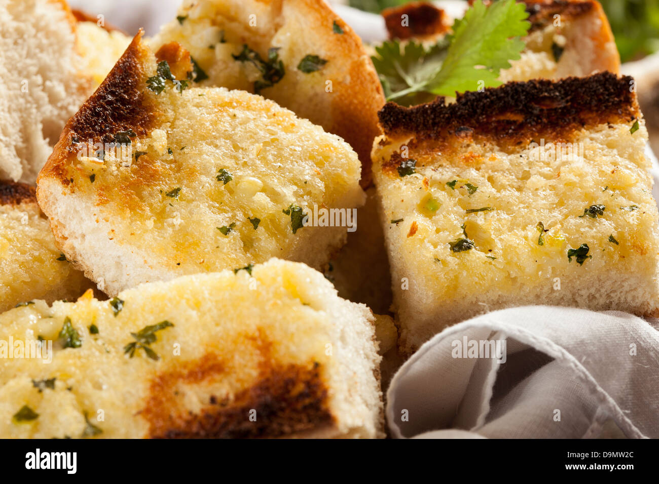 Homemade Crunchy Garlic Bread with butter and parsley Stock Photo Alamy