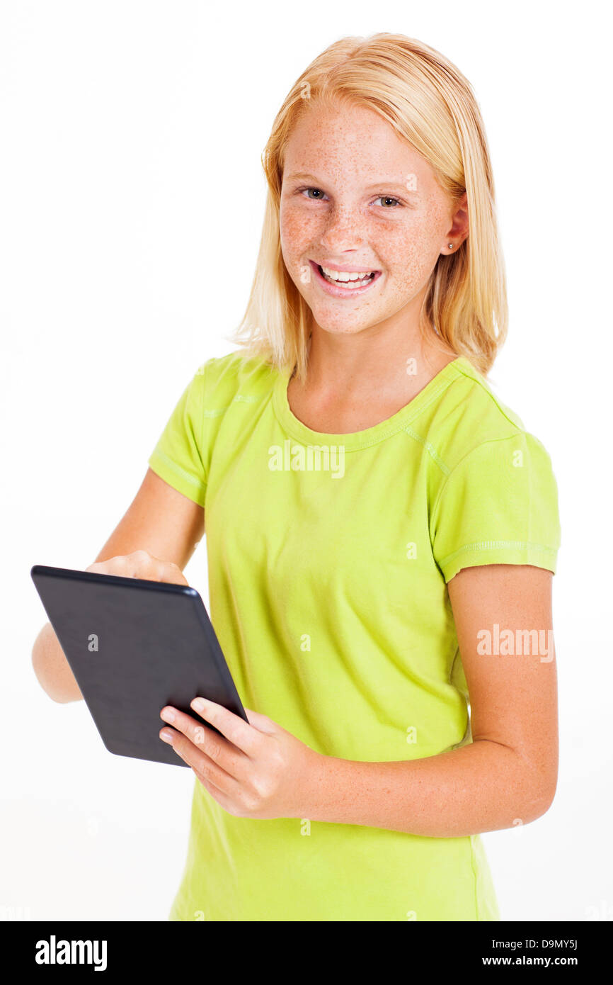 happy pre teen girl using tablet computer isolated on white Stock Photo