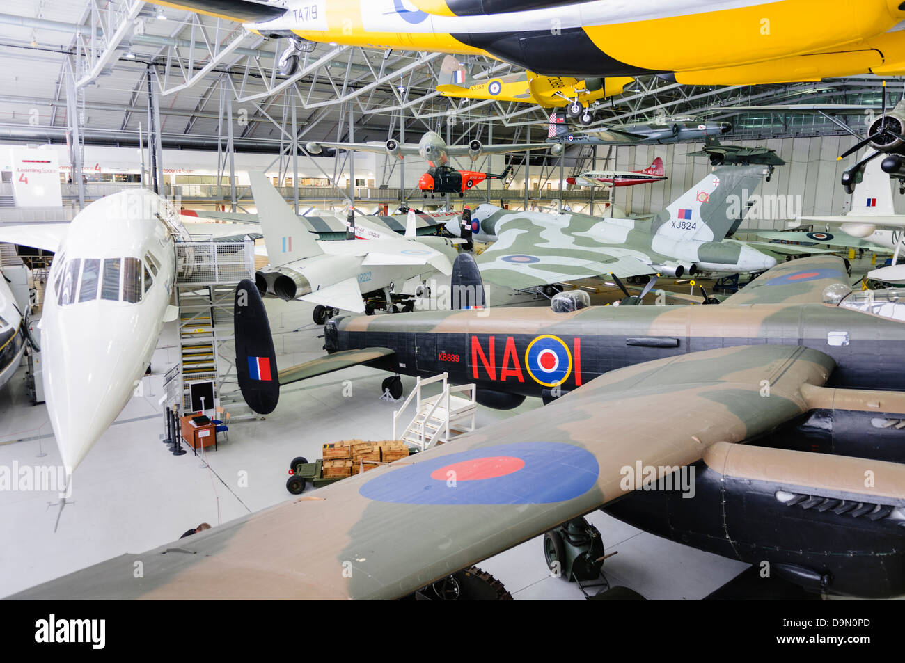 Main hangar at Duxford Imperial War Museum with a selection of aircraft Stock Photo