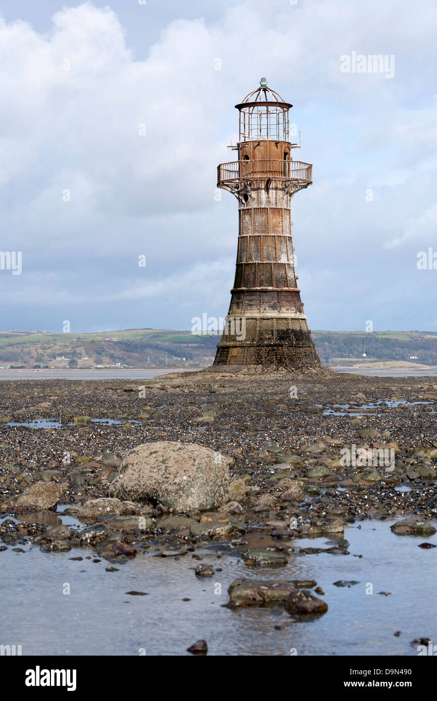 Cast iron lighthouse at Whiteford Point on the Gower Peninsula opposite