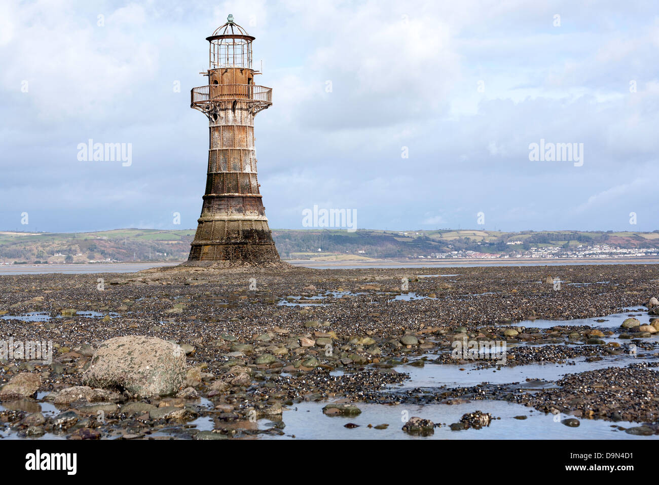 Cast iron lighthouse at Whiteford Point on the Gower Peninsula opposite