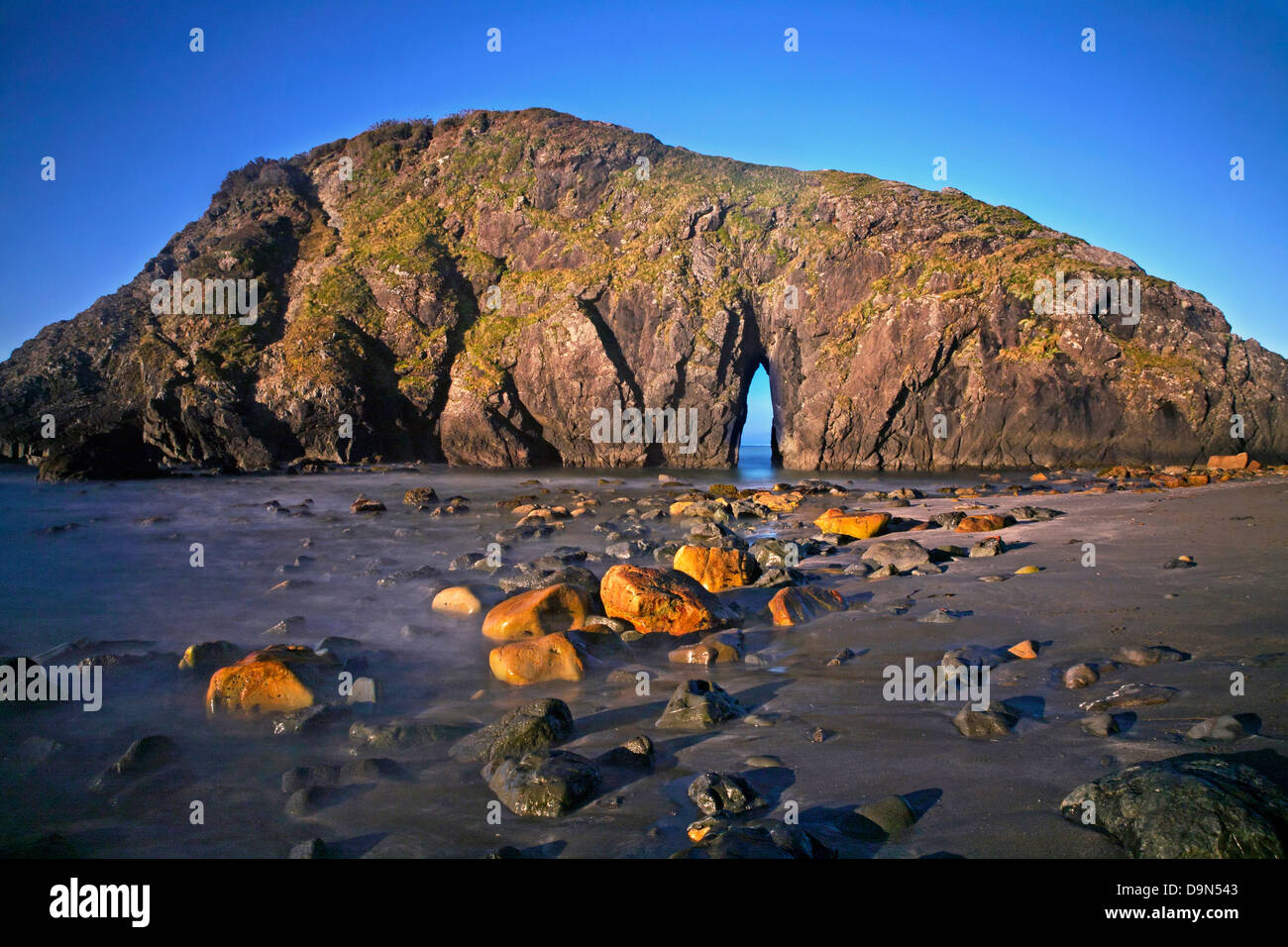OR01083-00...OREGON - Colorful boulders on Rock Beach in Harris Beach State Recreation Area. Stock Photo