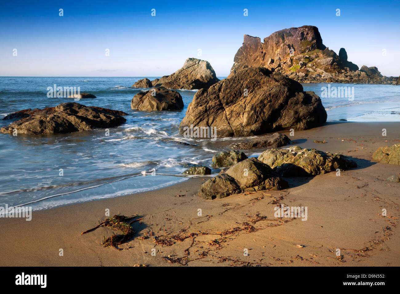 .OREGON - Islands and seastacks from Rock Beach at the edge of the Pacific Ocean in Harris Beach State Recreation Area. Stock Photo