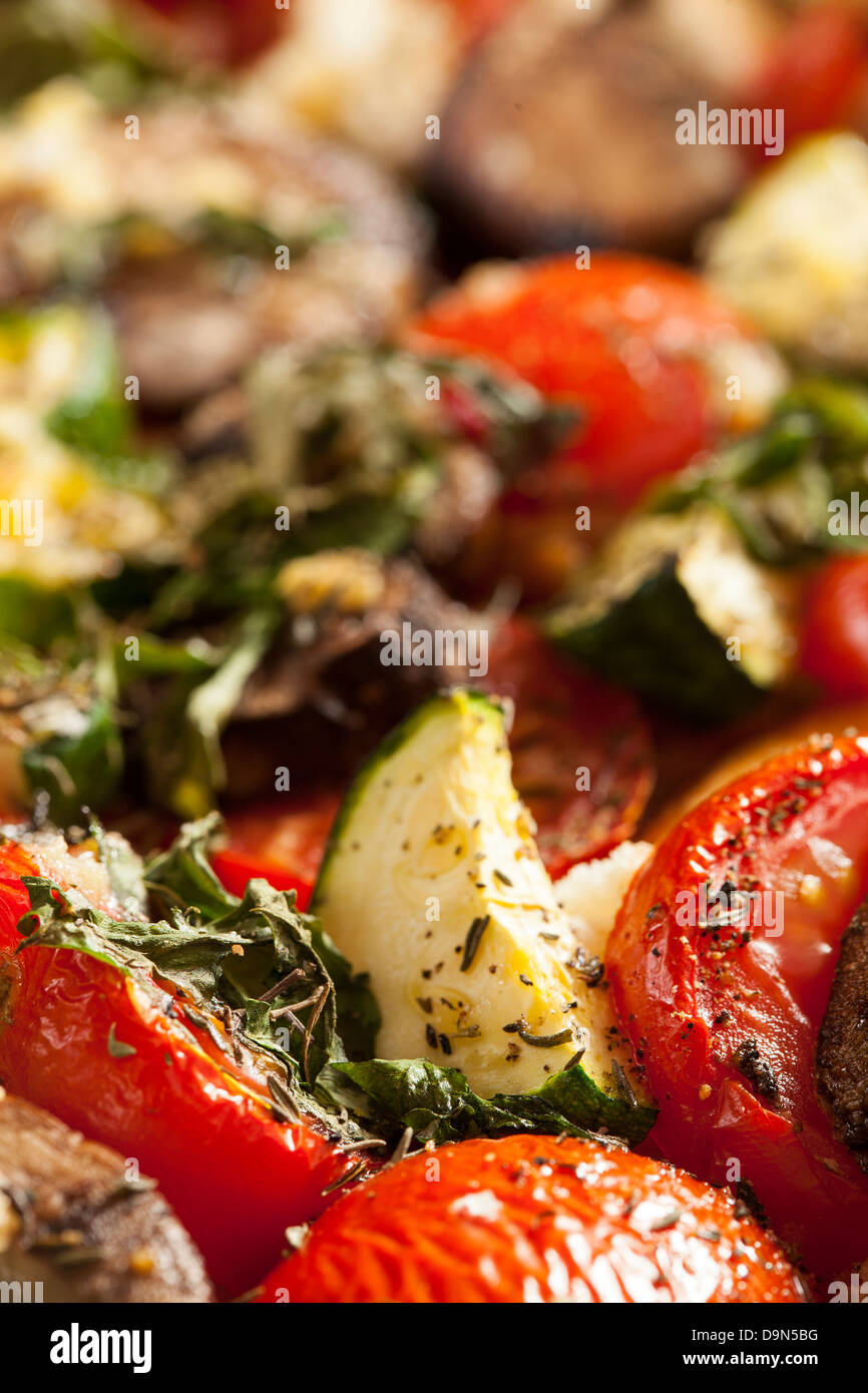 Homemade tomato bread gratin with basil and zucchini Stock Photo