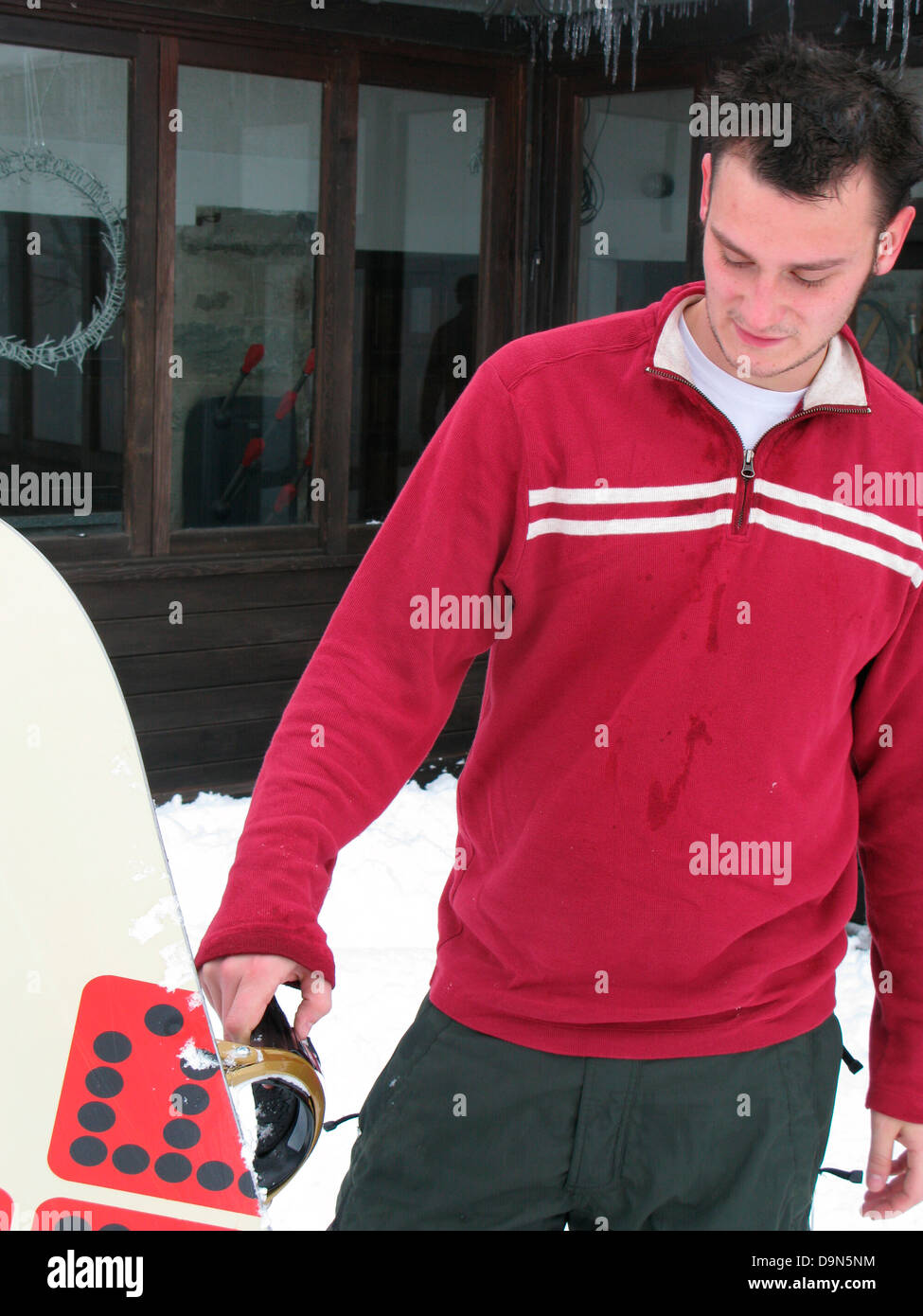 young man with snowboard Stock Photo - Alamy