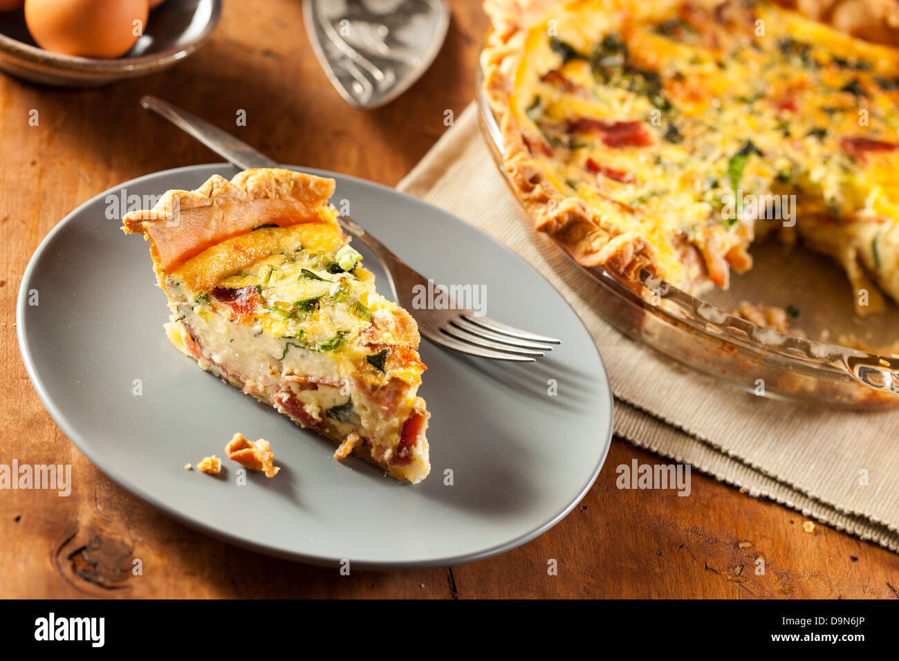 Homemade Spinach and Bacon Egg Quiche in a pie crust Stock Photo Alamy