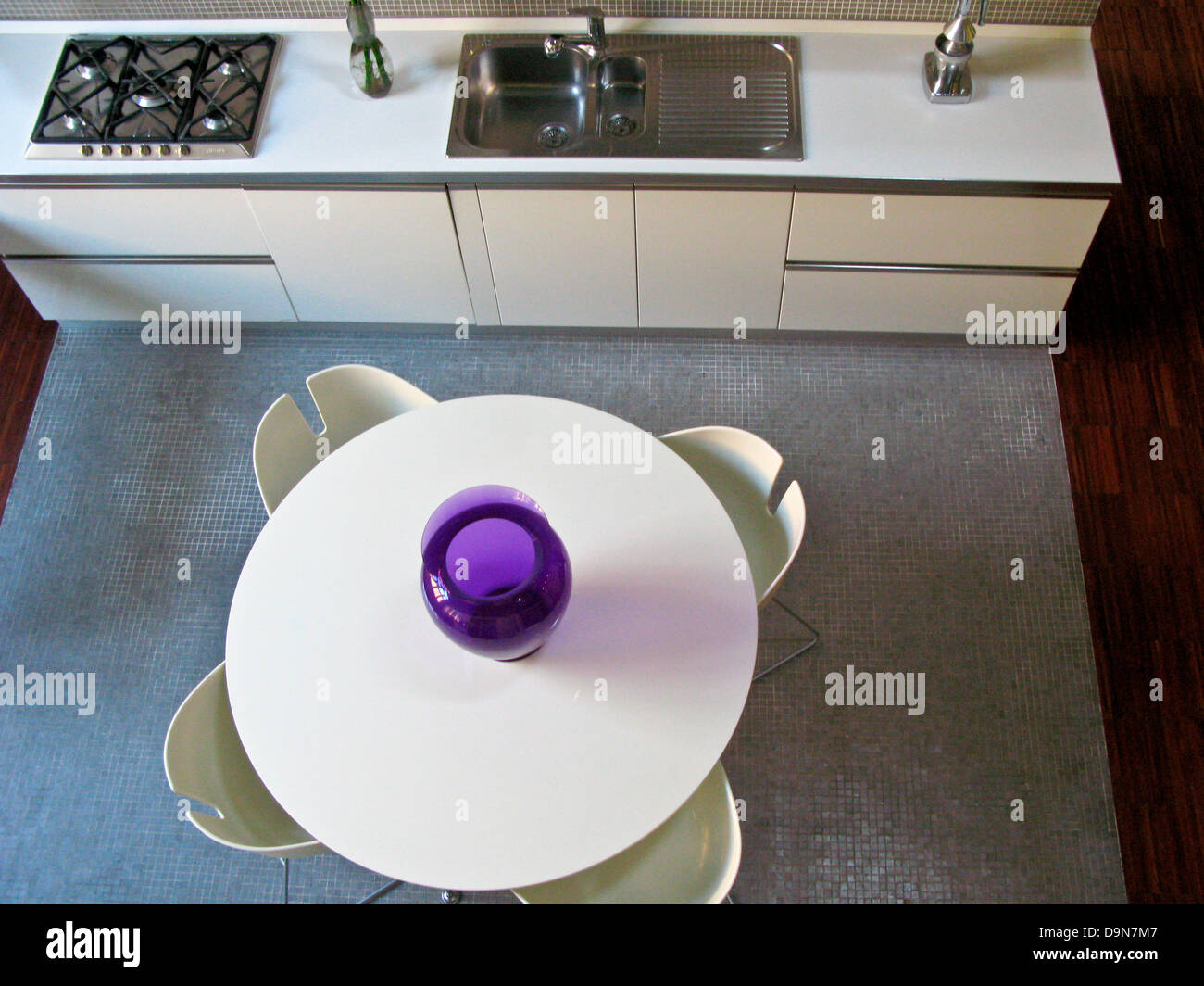 kitchen with round table Stock Photo - Alamy