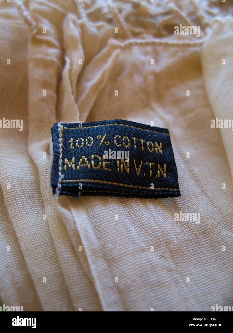 label 100% cotton made in v.t.n.,cotton shirt Stock Photo