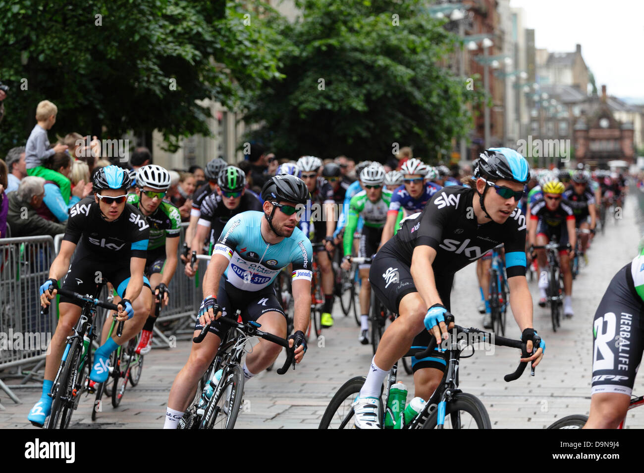 Buchanan Street, Glasgow, Scotland, UK, Sunday, 23rd June 2013.  British Cycling National Road Race Championships - Winner Mark Cavendish (centre) in the Men’s Road Race on the first lap in the city centre Stock Photo