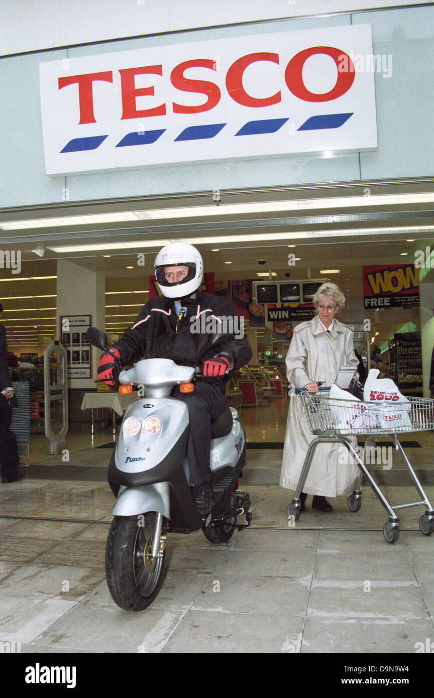 Tesco launch a new scooter in their London store Stock Photo Alamy
